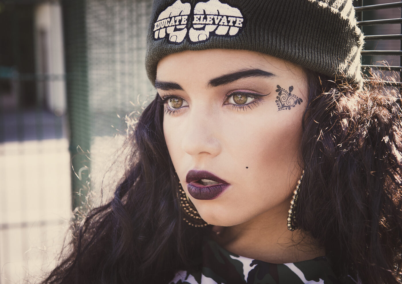 Chola face tattoo